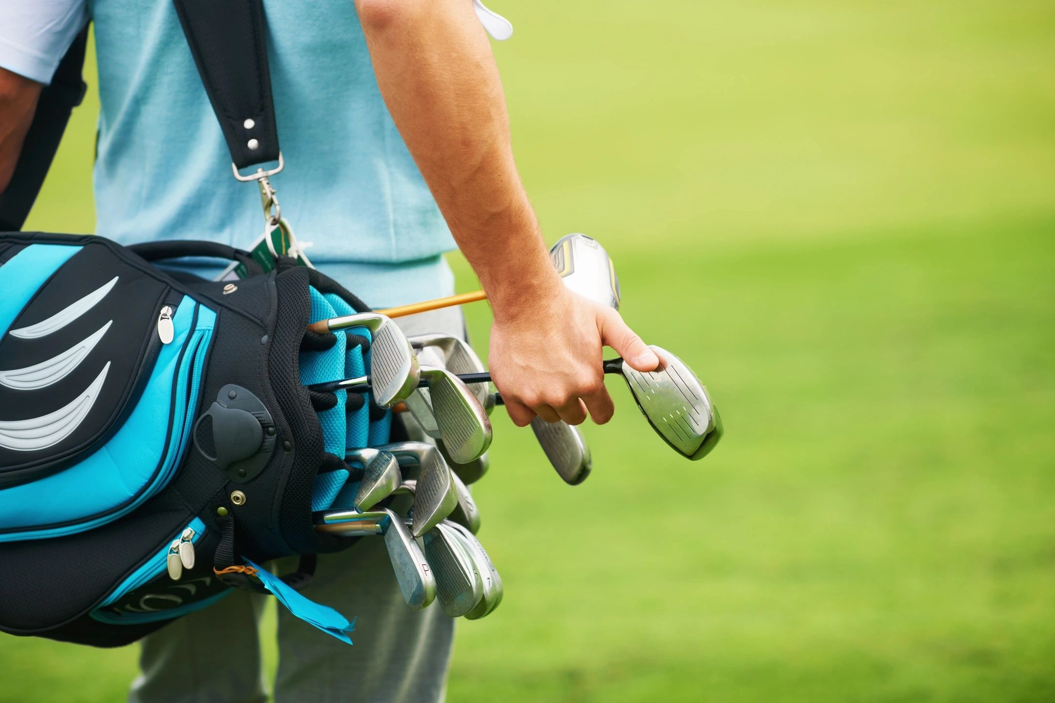 What is the best way to select a golf club for a shot?